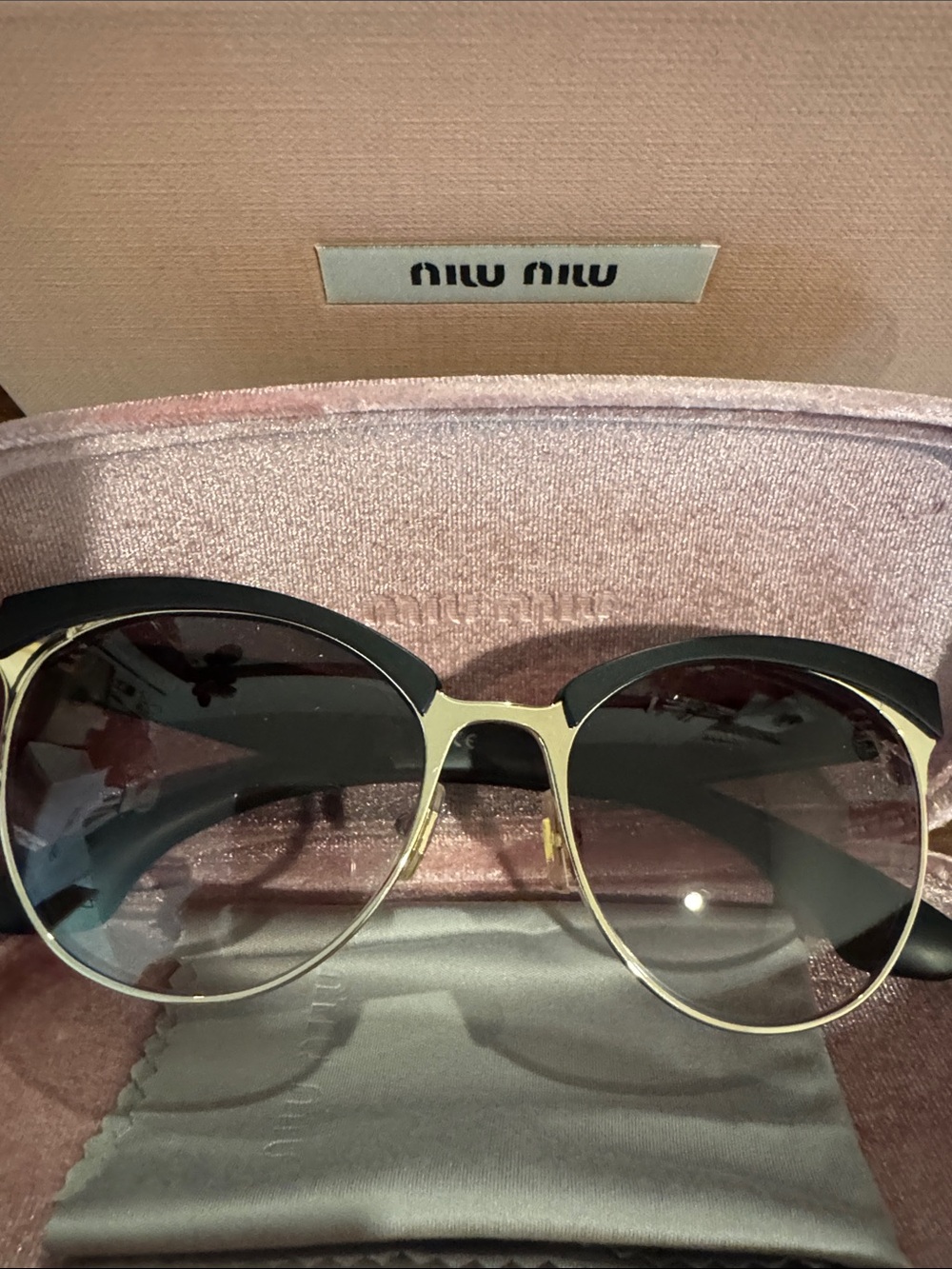 Miu Miu Black and Gold Women's Round-Edge Sunglasses